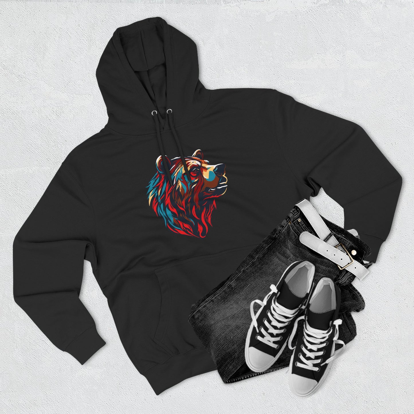 Hand-drawn Alaska Native inspired grizzly bear hoodie — original Indigenous wildlife design — flat lay view