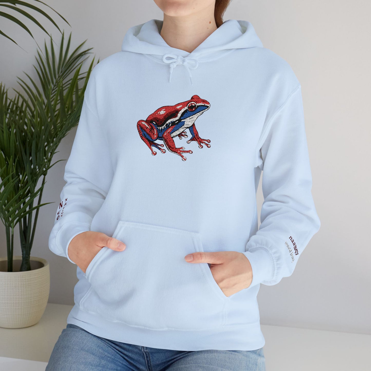 Hand-drawn Alaska Native inspired wood frog hoodie — original Indigenous wildlife design — back view