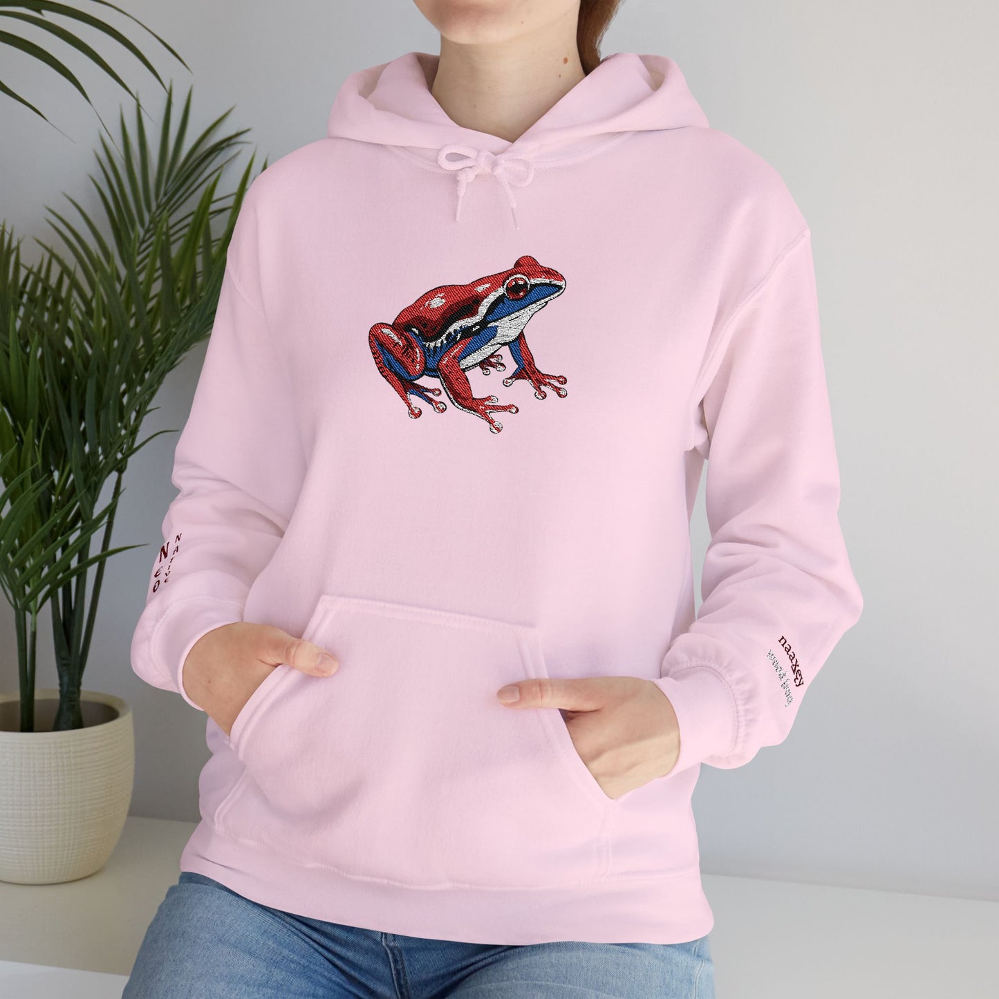 Hand-drawn Alaska Native inspired wood frog hoodie — original Indigenous wildlife design — shown in an alternate colorway