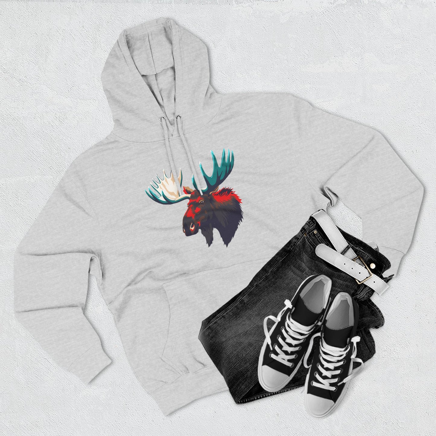 Hand-drawn Alaska Native inspired moose hoodie — original Indigenous wildlife design — flat lay view