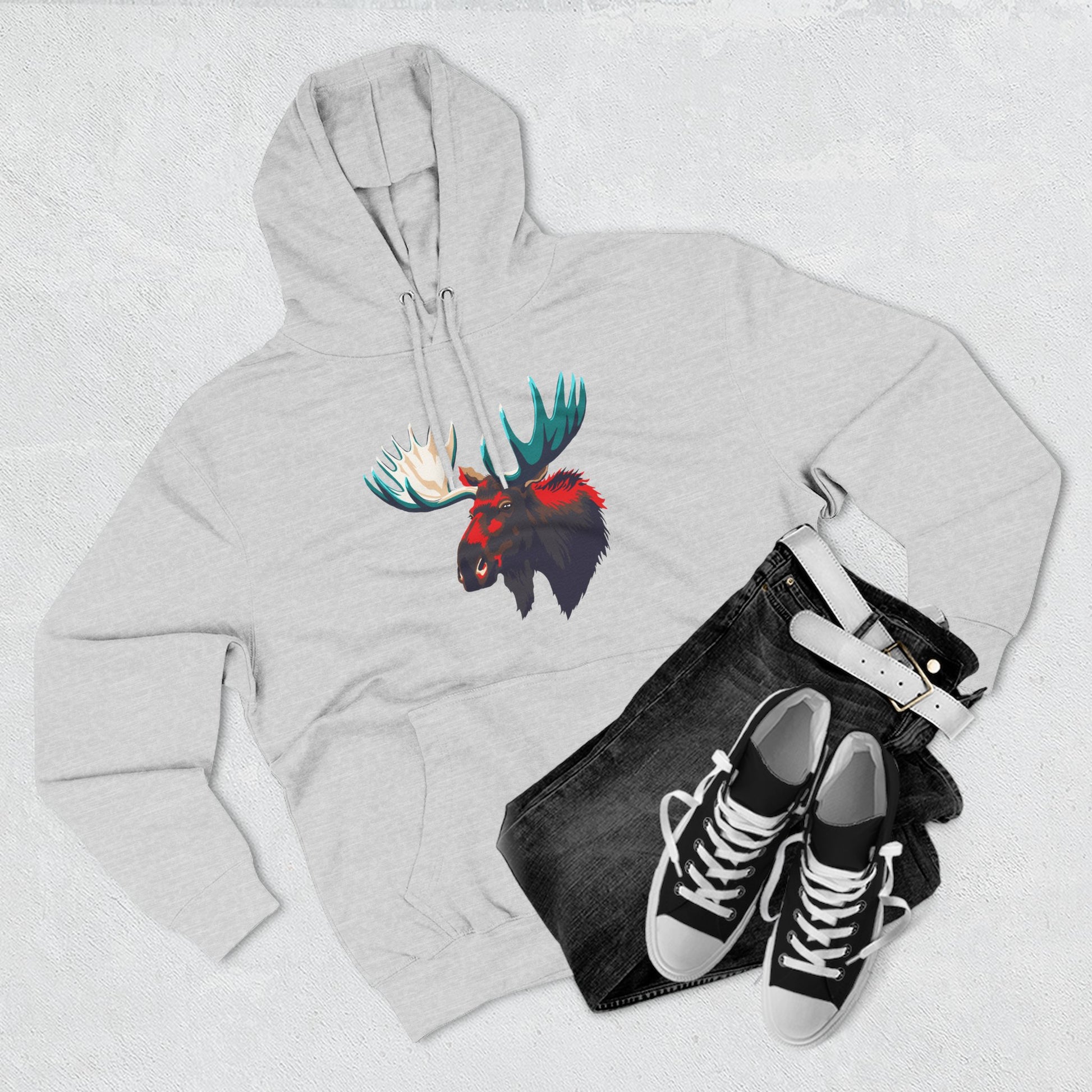 Hand-drawn Alaska Native inspired moose hoodie — original Indigenous wildlife design — flat lay view